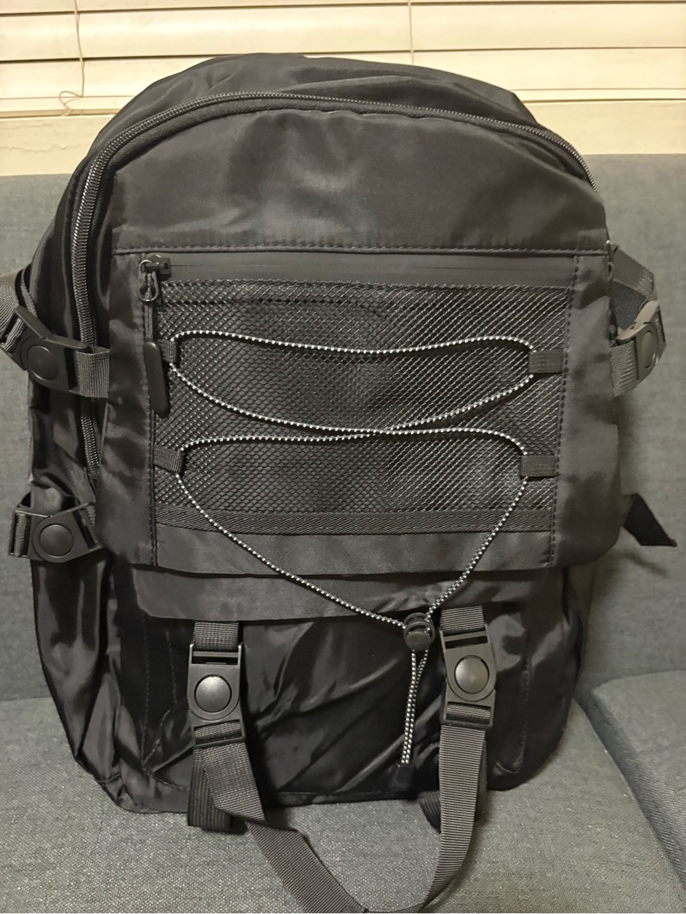 Men's Black Tactical Backpack with Front Bungee and Buckle Straps